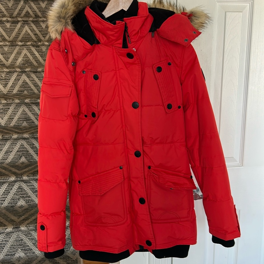 Noise winter jacket in red orange colour